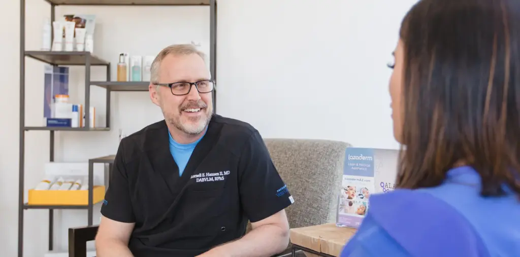 Medical director consulting with a patient at Lazaderm Medical Spa in Chandler, Arizona.